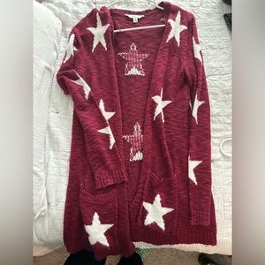 Red cardigan with stars